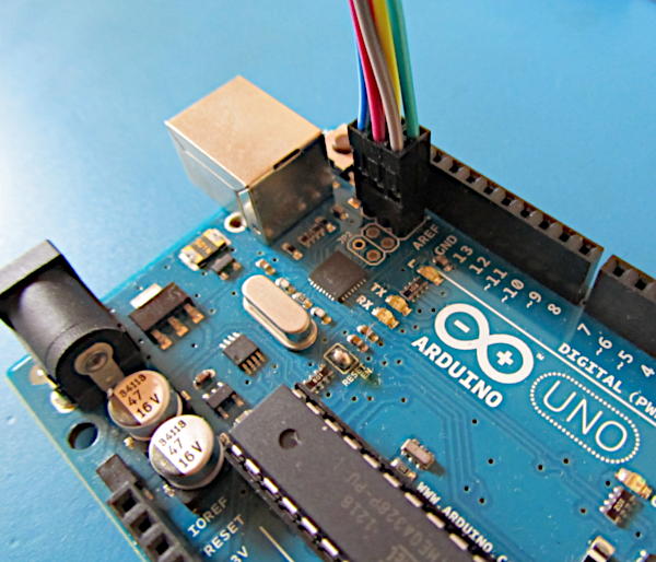 Close up of wires plugged into the ATmega16U2 ICSP header